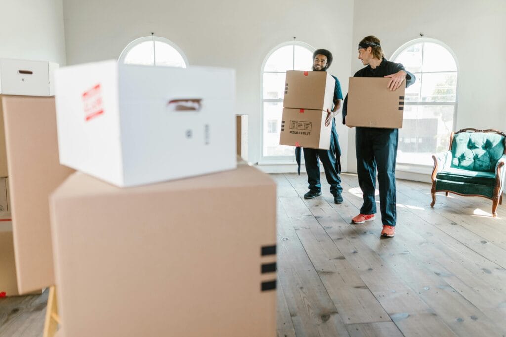 Professional movers handling office equipment during a corporate relocation in Nairobi, Kenya.